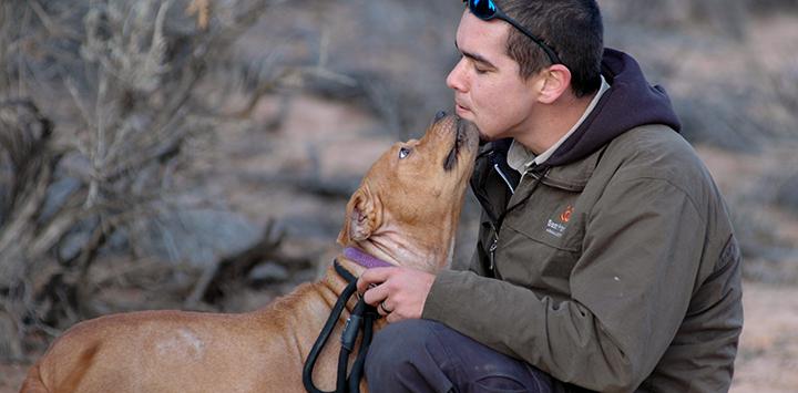 John Garcia and Vicktory Dog Meryl, a former Michael Vick dog