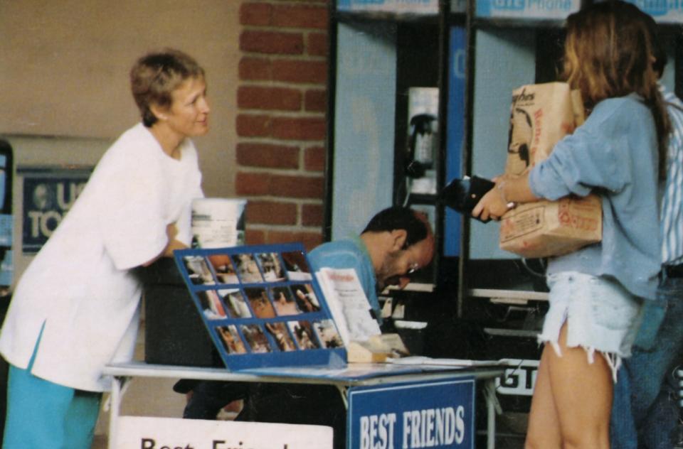 Vintage photo of people at donation table