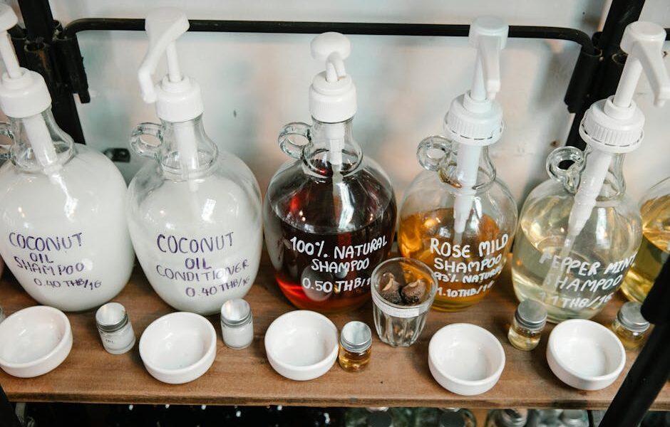 Eco-friendly shampoos and conditioners on a shelf, showcasing natural and coconut oil products.
